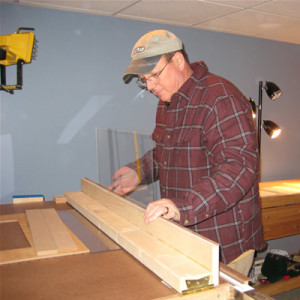 Ron now works with the optical quality acrylic on the bending jig, creating the cover to fit the oak base.